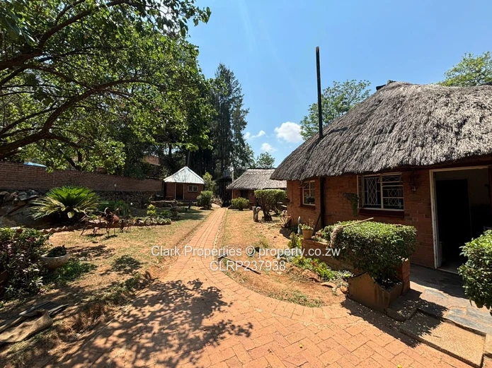Spacious One-Acre Property with Unique Thatched Residence