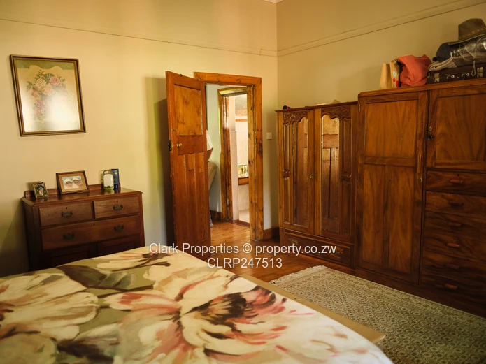 Charming Hillside Home with Undeveloped Land